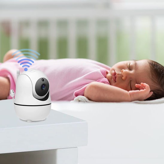 Camera bebe placée près du lit pour veiller sur l’enfant