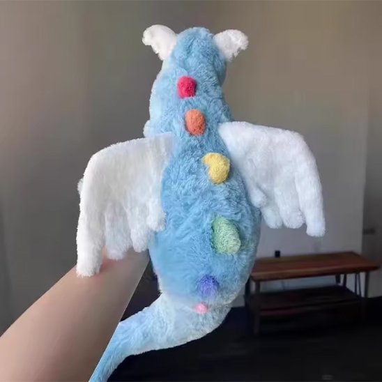 Peluche dragon pour chambre de bébé