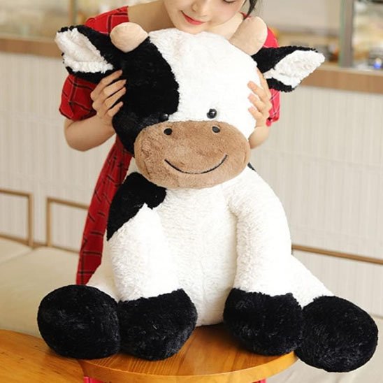 Peluche vache apportant une ambiance calme à la chambre