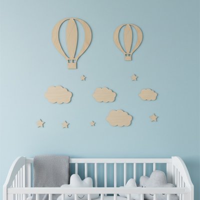 Stickers muraux posés sur un mur de chambre bébé