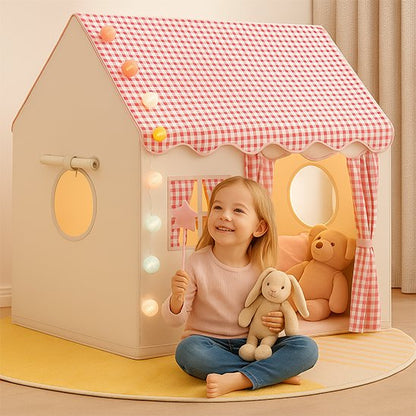 Tente enfant en tissu installée pour un coin lecture et jeu