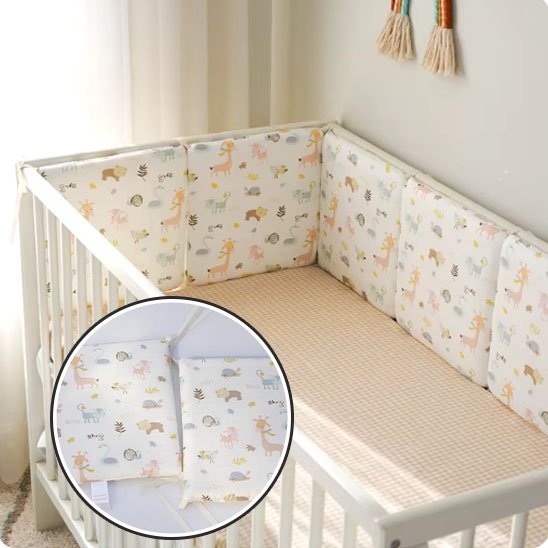 Tour de lit bébé intégrée à l’univers de la chambre bébé